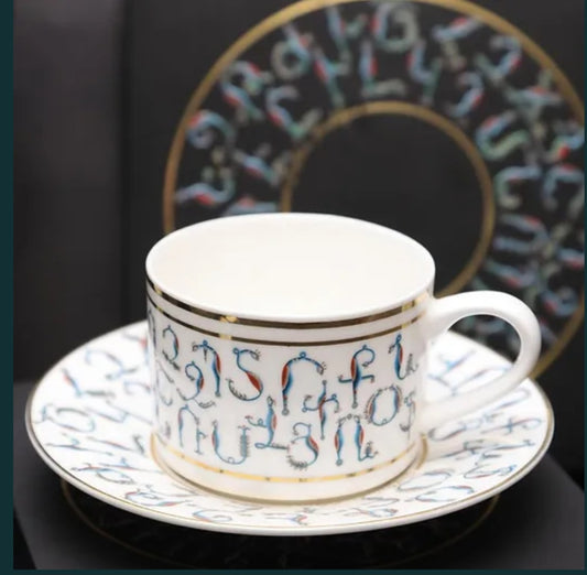 Armenian Alphabet — 24K Gold Porcelain Tea Cup & Saucer by KARCHIKYAN