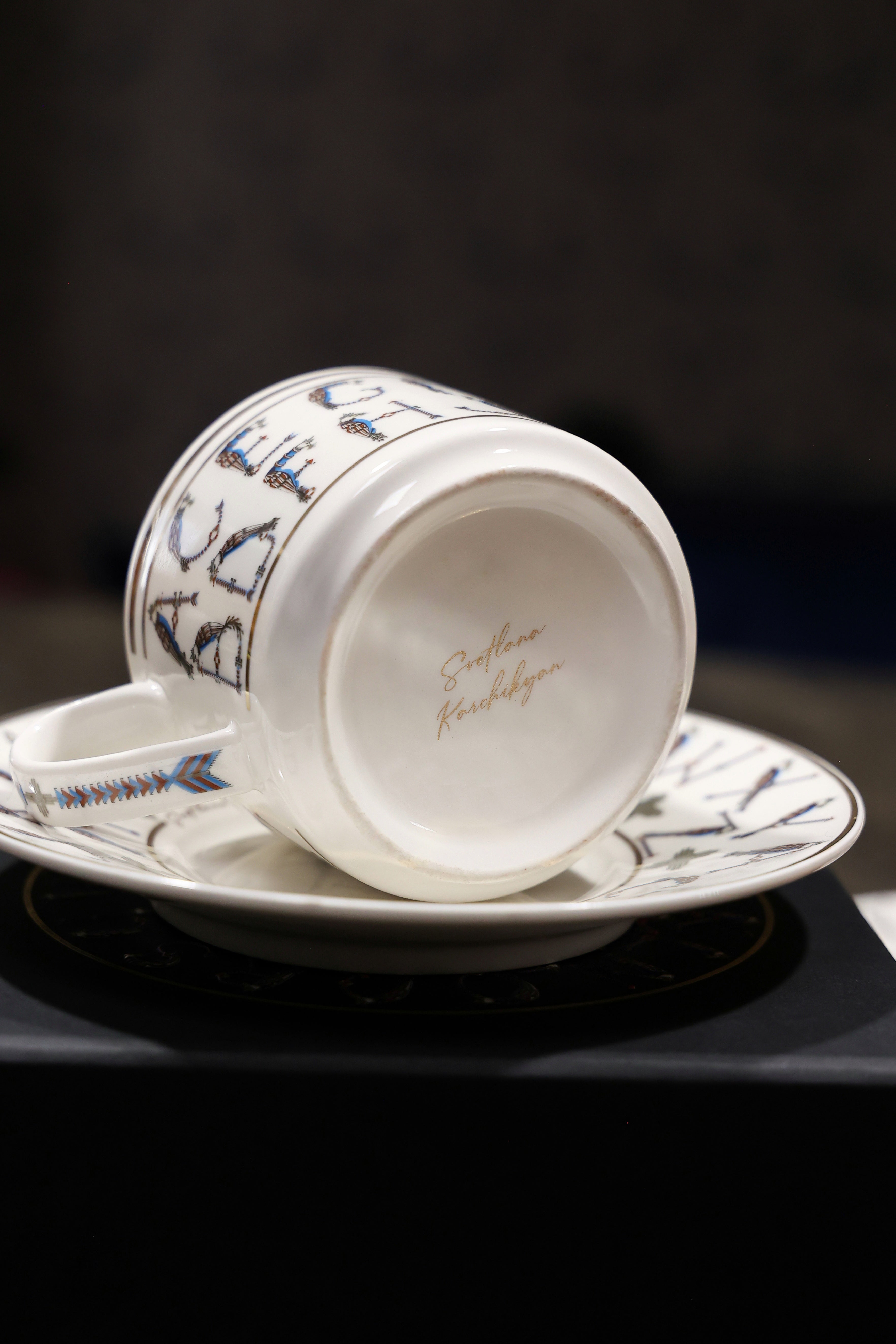 English Alphabet  — 24K Gold Porcelain Tea Cup & Saucer by KARCHIKYAN
