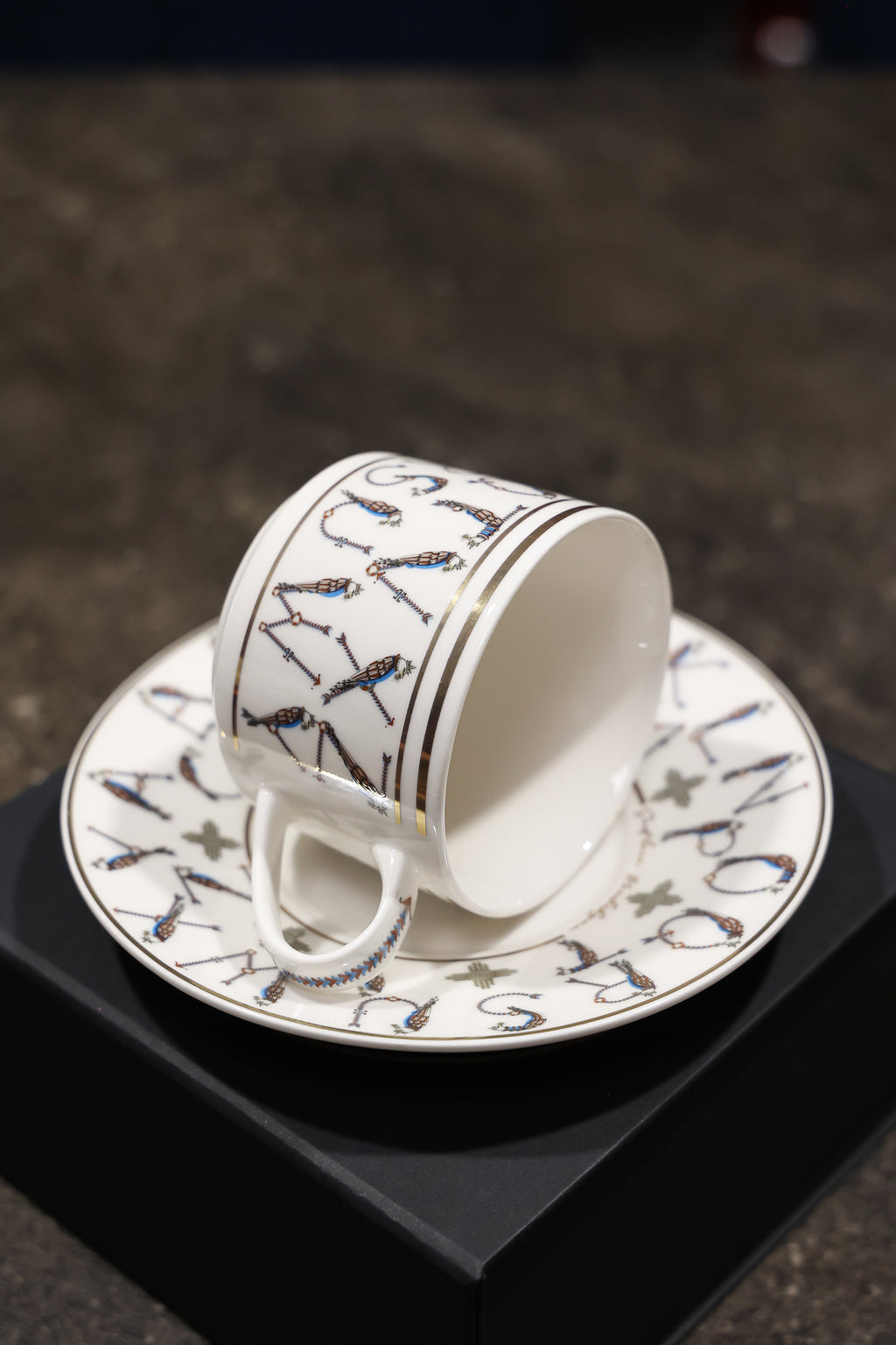 English Alphabet  — 24K Gold Porcelain Tea Cup & Saucer by KARCHIKYAN