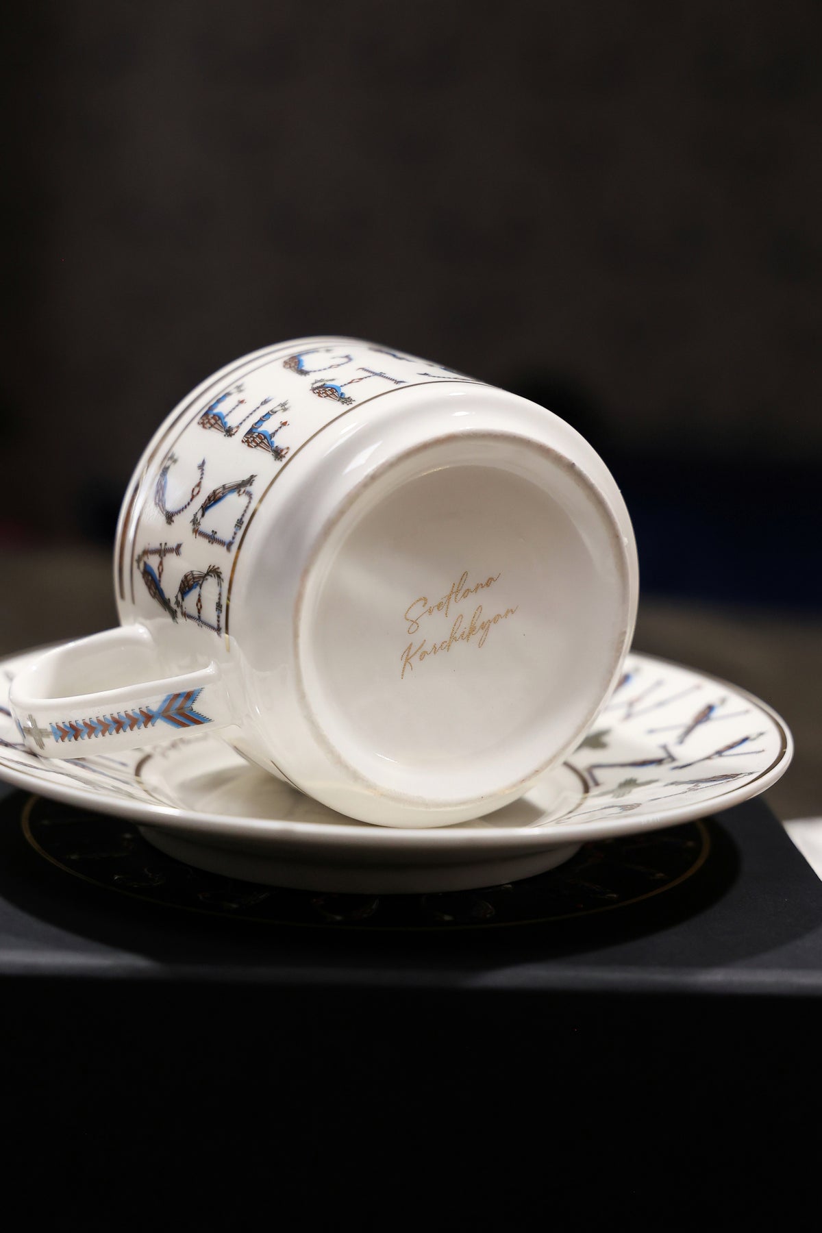 English Alphabet  — 24K Gold Porcelain Tea Cup & Saucer by KARCHIKYAN