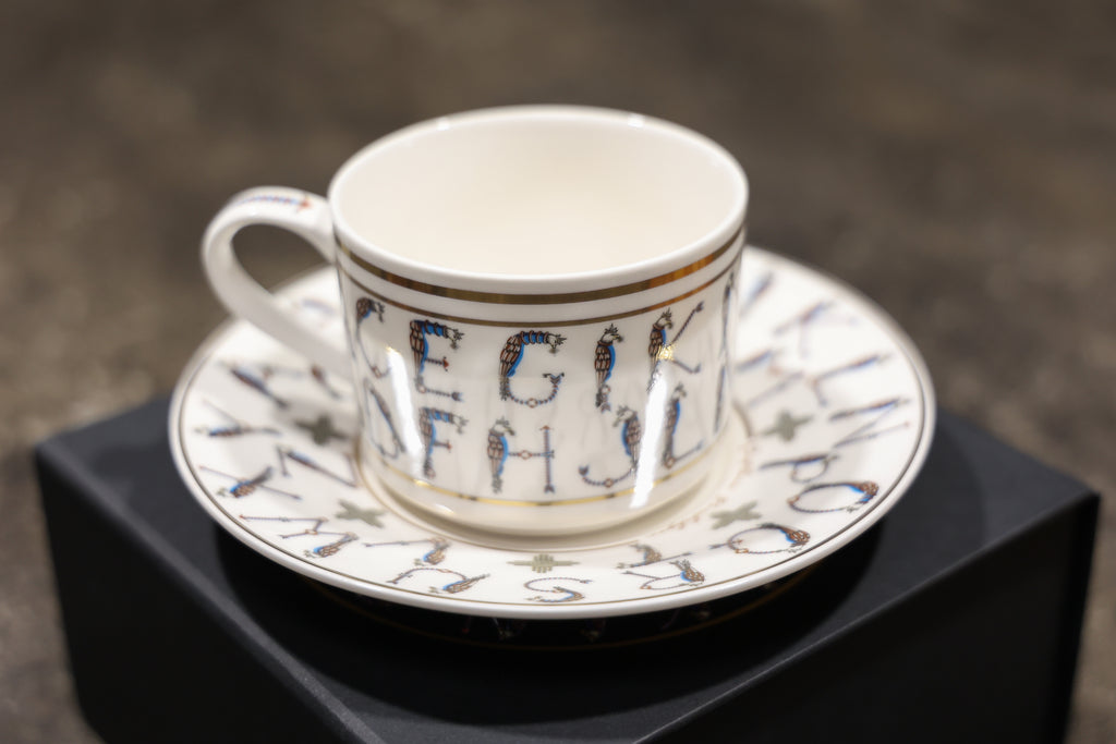 English Alphabet  — 24K Gold Porcelain Tea Cup & Saucer by KARCHIKYAN