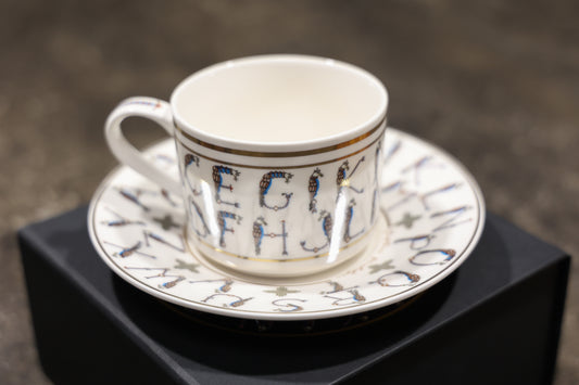 English Alphabet  — 24K Gold Porcelain Tea Cup & Saucer by KARCHIKYAN